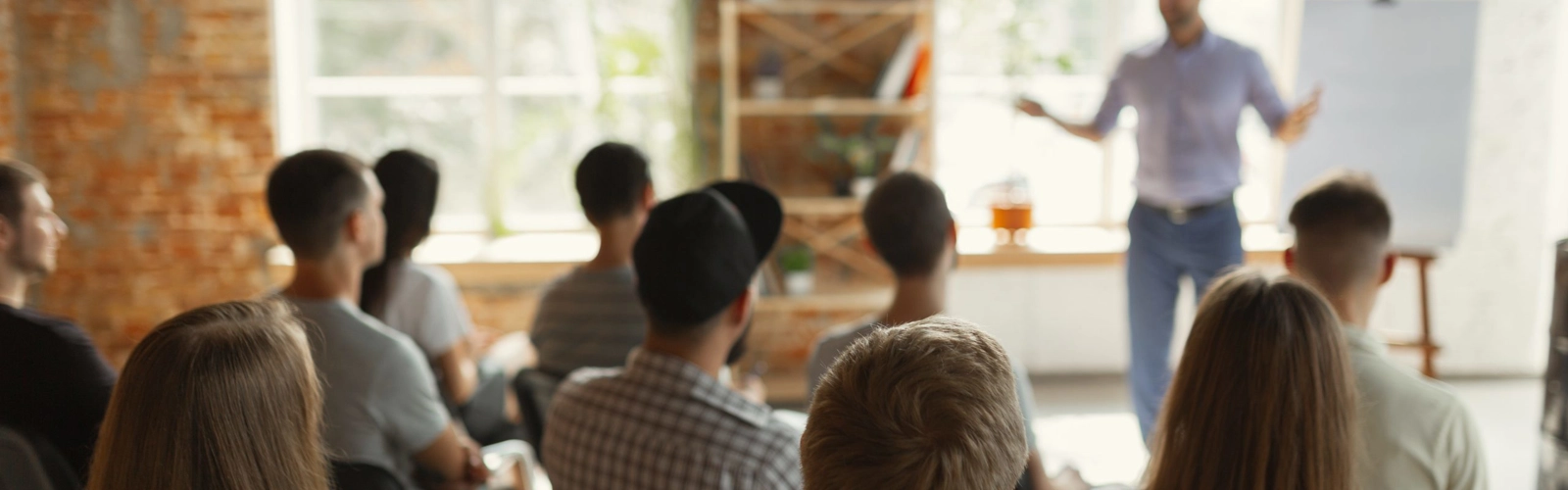 Class of people taking part in corporate training Class of people taking part in corporate training