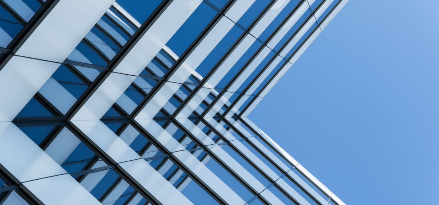Glass skyscraper and blue sky Glass skyscraper and blue sky