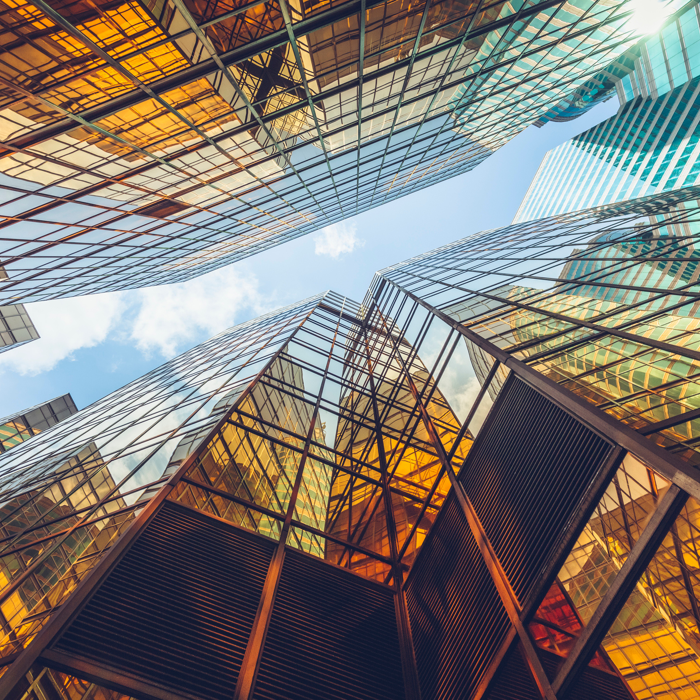Glass skyscrapers and blue sky Glass skyscrapers and blue sky