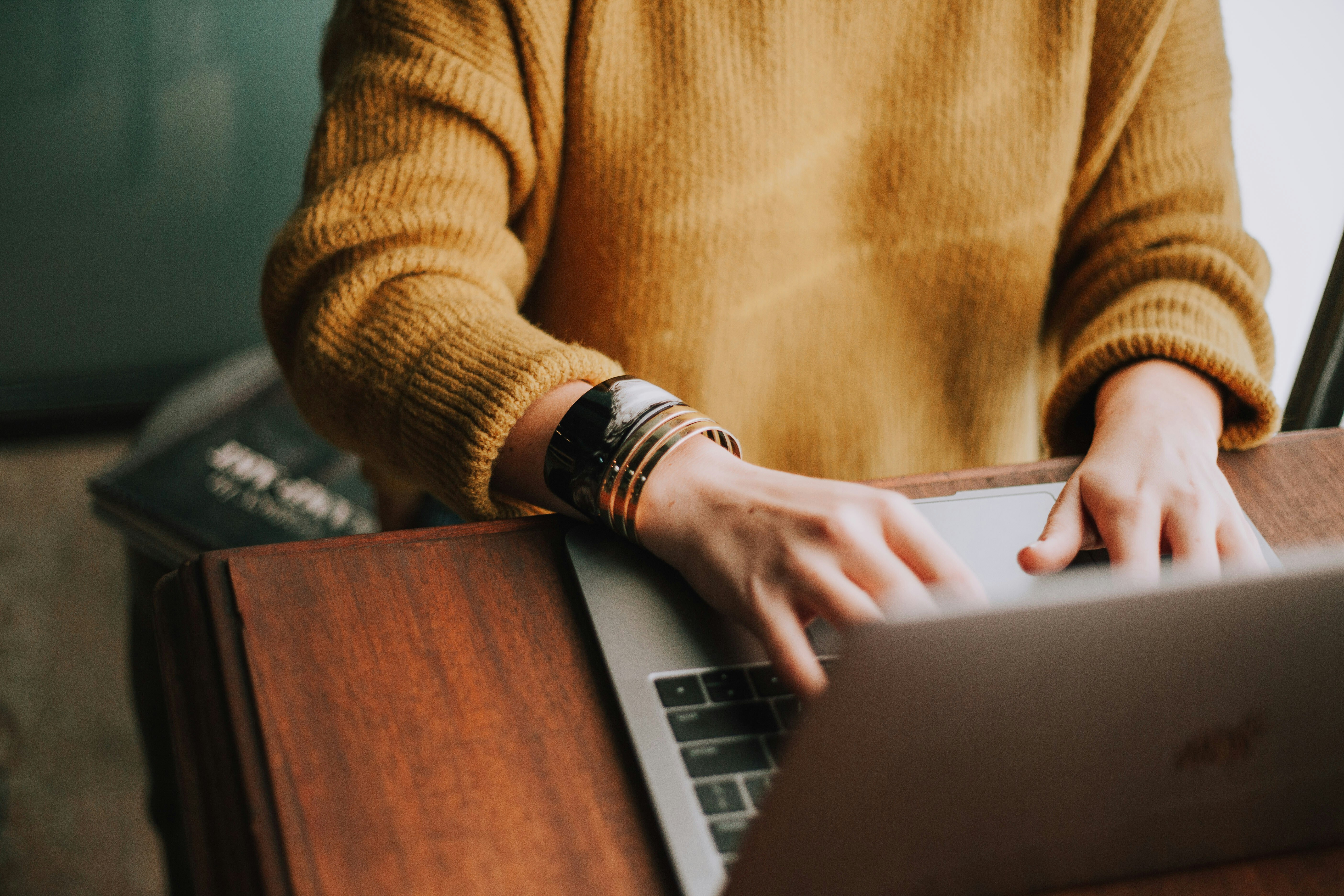 company organising training person sitting on laptop