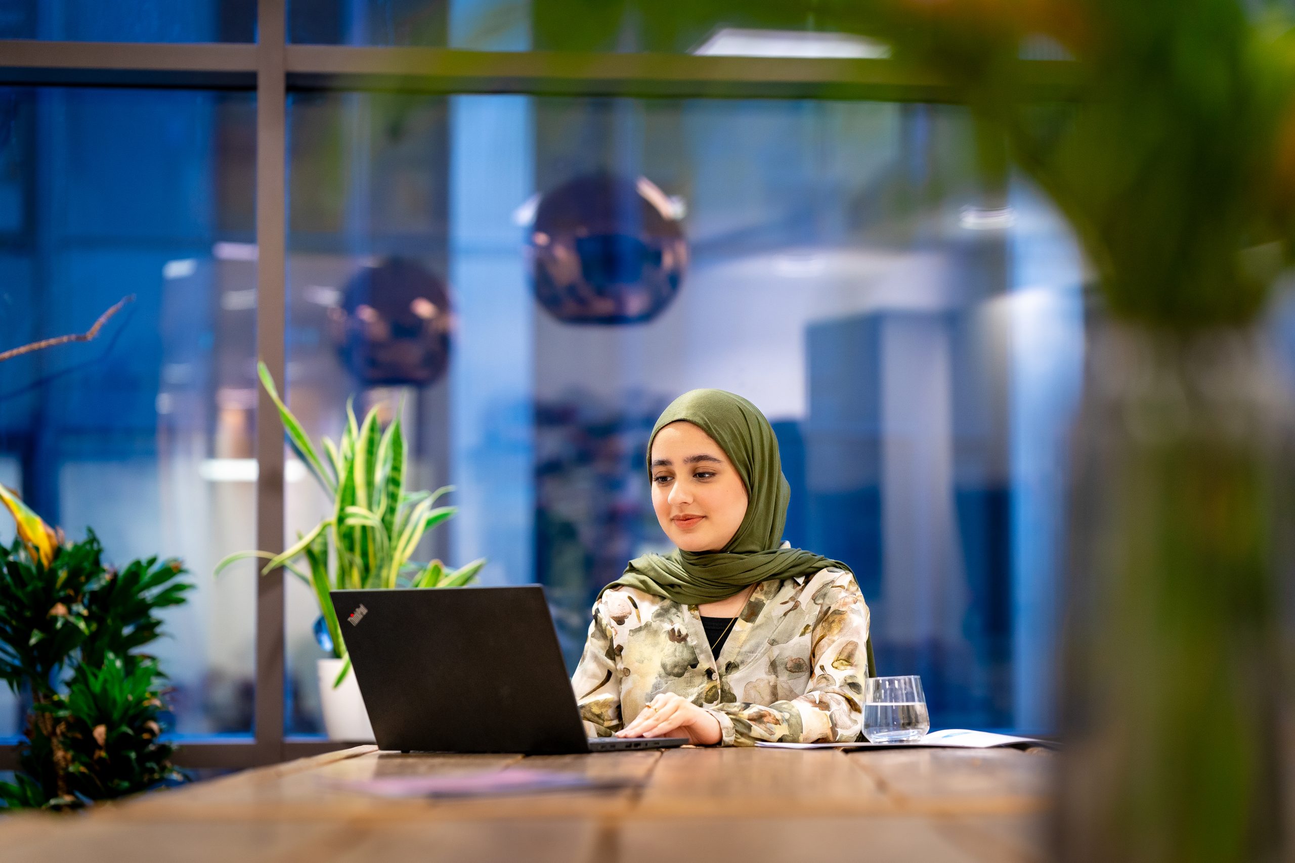 person sitting in front of laptop from CIL