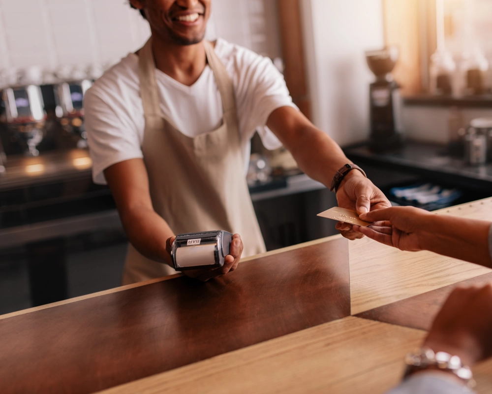 Restaurant staff shaking hands with customer Restaurant staff shaking hands with customer